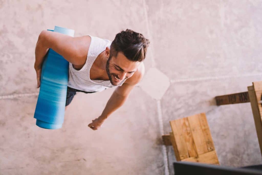 Male on his way to yoga