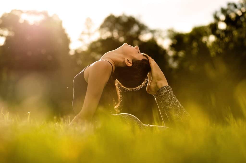 yoga woman on green park